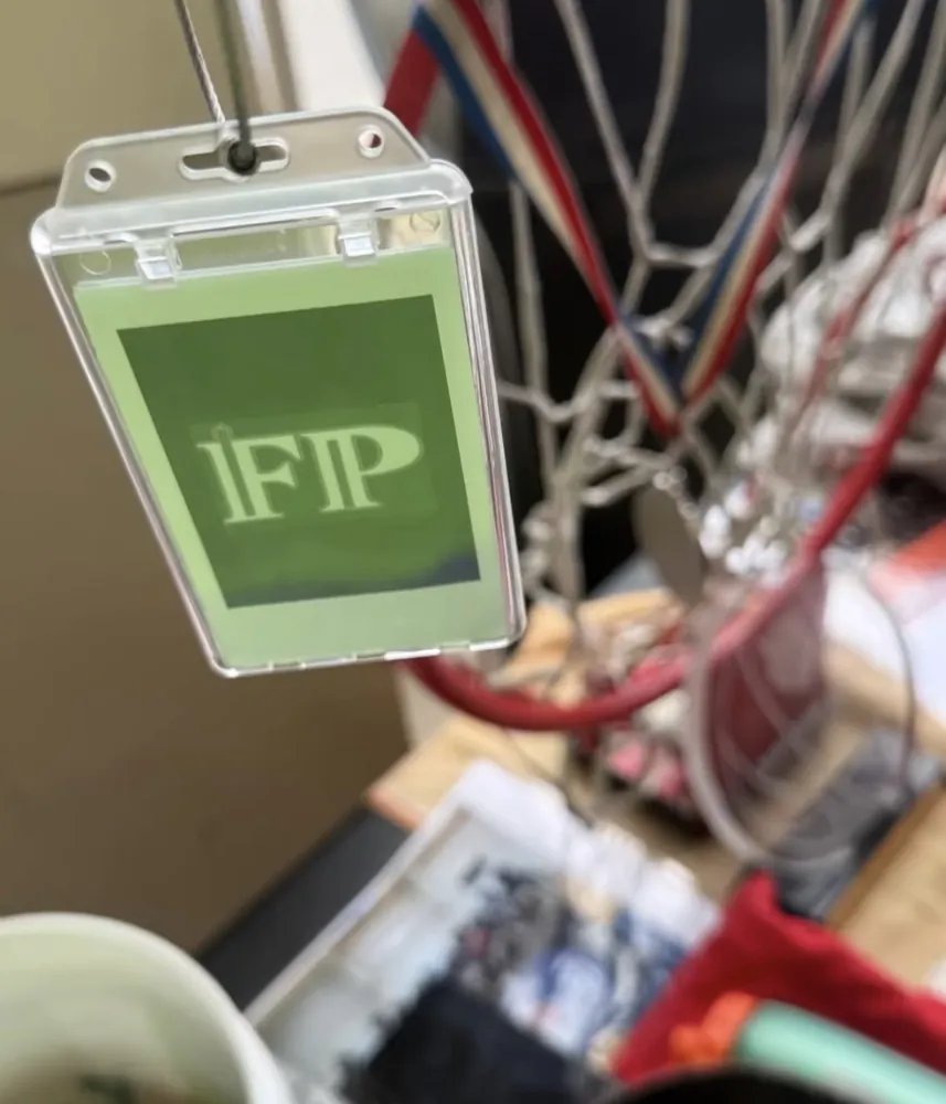 A custom Frame Wave tag hanging at a sports facility